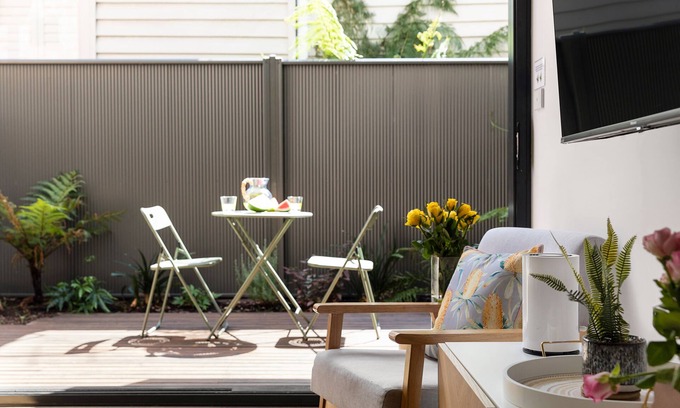 St Kilda Condo | Industrial Style Retreat on Chapel Street for Families
