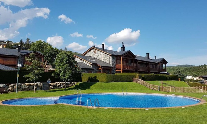 Angoustrine Apartment | Experience Infinity Mountain View with Scenic Pool & Hot Tub
