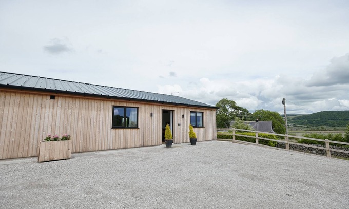 Settle Cottage | Experience Ingleborough Lodge with a Garden in Settle