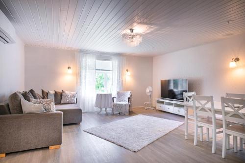 Ahtari Apartment | Inhan Kartano: Seaside Getaway with Private Beach Access