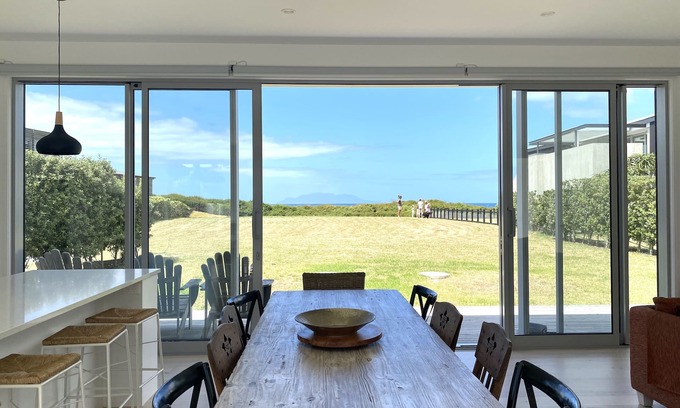 Omaha House | Explore Private Beachfront Bliss with Ocean View Amenities
