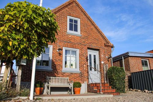 Daenschendorf House | InselGlück: Oceanfront Retreat with Hot Tub & Pet-Friendly