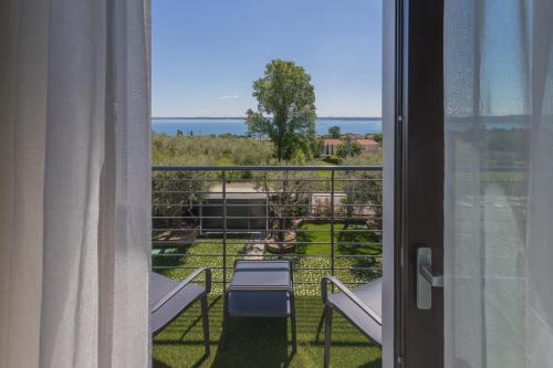 Moniga del Garda Bed & Breakfast | Oceanfront Bliss at INSULA FELIX Bed&Breakfast - Rated 9/10