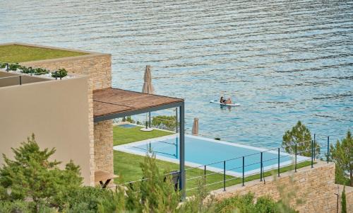 Arkadiko Chorio Apartment | Discover Into The Blue Suites: Oceanfront Paradise Awaits