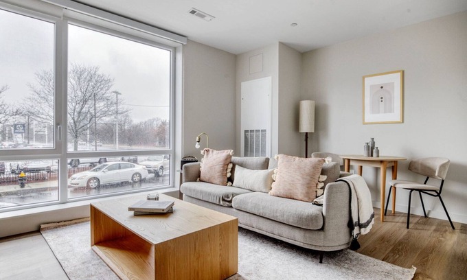 Boston Apartment | Cozy 1BR Brighton Retreat with Gym, W/D & River Views