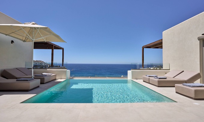 Ios Hotel | Indulgent Ios Grand Pool Suites with Oceanfront Amenities