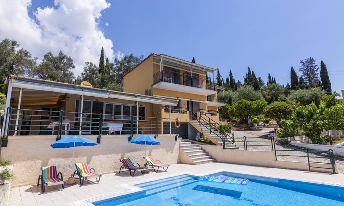 Ipsos Apartment | Relax at Ipsos Pool Apartments: Family-Friendly Retreat
