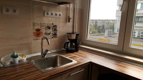 Ploiesti Apartment | Top-Rated Iri's Downtown Apartment with Hot Tub Access