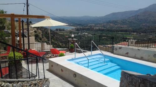 Exopoli Apartment | Irida: Oceanfront Retreat with Pool and 9/10 Guest Rating