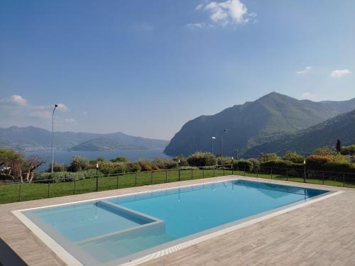 Zorzino Apartment | Cozy IseoLakeRental - Costa del Sole with Oceanfront Views