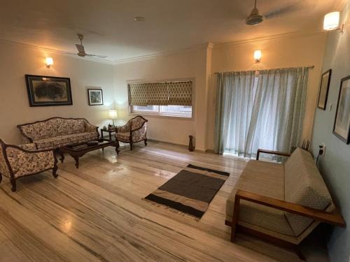 Vadodara Apartment | Family-Friendly Ishan Apartments with Charming Individual Rooms