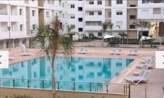 Cite Al Mohammadi Apartment | Discover ISLAN BAY Apartment with Pool & Balcony