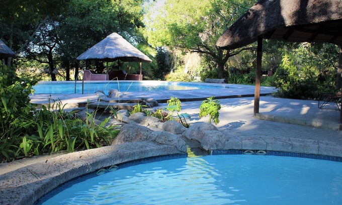 Maun Cabin | Island Safari Lodge: Family-Friendly Retreat with Pool & Dining