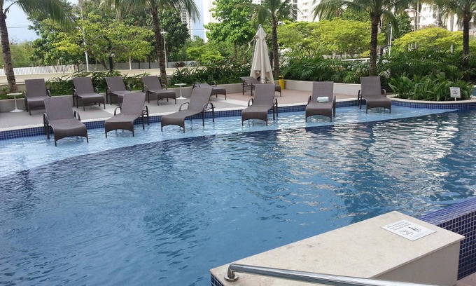 Jacarepagua Apartment | Designer Suite with Ocean View and Top Amenities Await