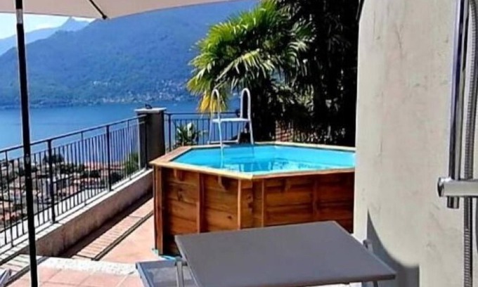 Maccagno Apartment | Scenic Lake View Apartment with Pool and Family Amenities