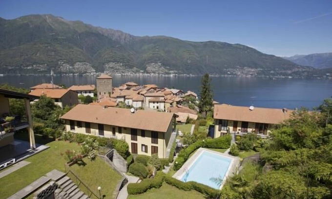 Maccagno con Pino e Veddasca Apartment | Elegant Studio Apartments with Pool and Lake View Amenities