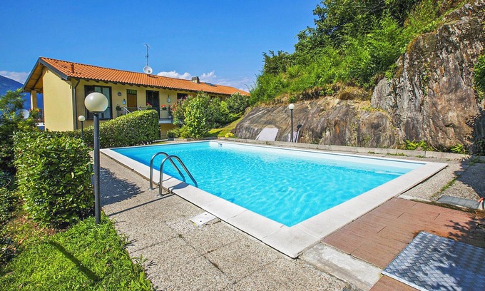 Maccagno con Pino e Veddasca Apartment | Stylishly Furnished Studio Apartments with Pool Access