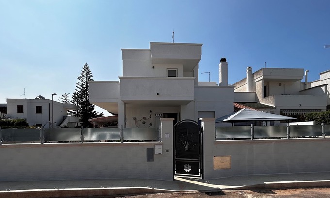 Torre Santa Sabina Villa | Top-Rated Crescent Cottage with Oceanfront Views