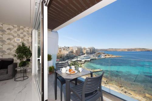 Bugibba Apartment | Seafront Ivory Suite in Bugibba with Scenic Views