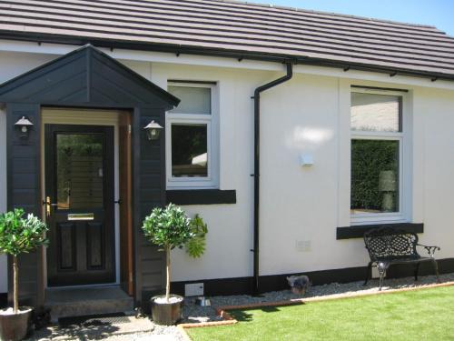 Innellan House | Discover Ivy Cottage: Family & Pet Friendly Escape!