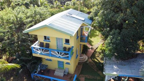 Calibishie Apartment | Discover Jacoway Inn: Oceanfront Retreat with Spa & Pets Welcome