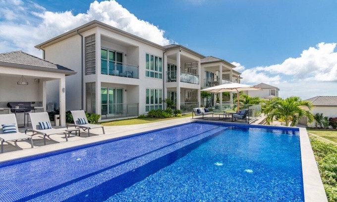 Calvigny Condo | Jade: Oceanfront Views and Top-Rated Amenities Await!