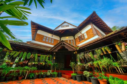 Kozhikode House | Scenic Jaladhija - Lakeview Homestay for Family Getaways