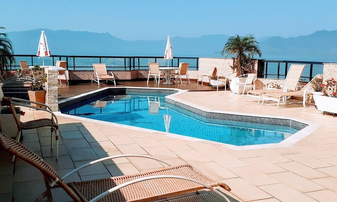 Centro Hotel | Relaxing Jangada Flat Service with Oceanfront Views & More