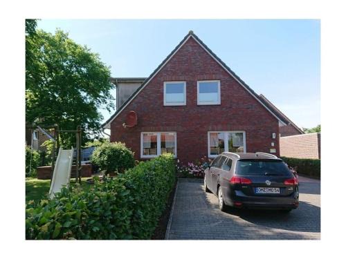 Norddeich House | Relax at Janssen: A Cozy 4-Star Family Getaway