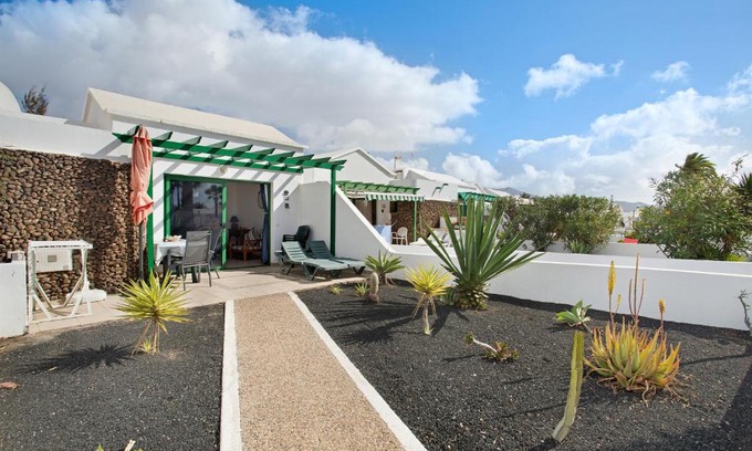 Playa Blanca Apartment | Guest Rated 10/10 at Jardin del Sol 22 with Pool Access