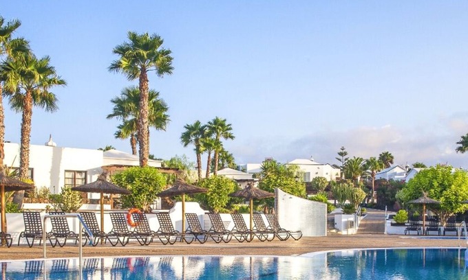 Playa Blanca Apartment | Experience Jardines del Sol: Oceanfront Retreat with Spa
