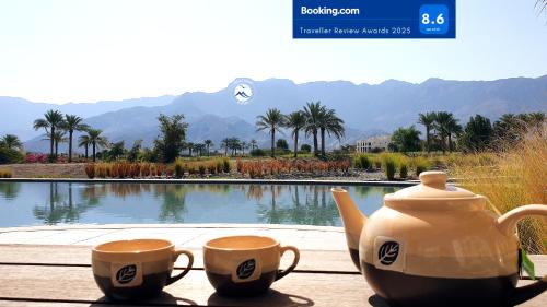 As Sifah Apartment | Discover Jebel Sifah Suites: Oceanfront with Pool Access