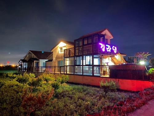 Downtown House | Seaside Escape at Jeju Gillime Pension with Breakfast