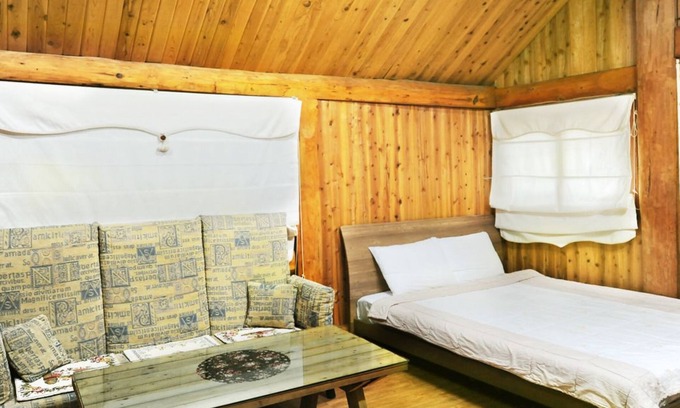 Pyoseon Condo | Inviting Getaway at Jeju Log Pension with Family-Friendly Perks