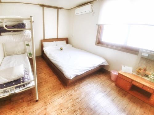 Downtown House | Cozy Jeju Masil Guesthouse with Breakfast & Hot Tub Access
