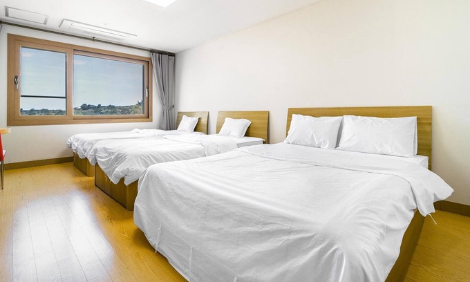 Downtown House | Cozy Jeju Samda Hostel: Family-Friendly with Kitchen Access