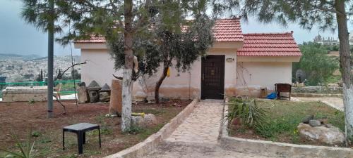 Jerash Apartment | Cozy Jerash Roman North Gate Cottage with Fireplace Access