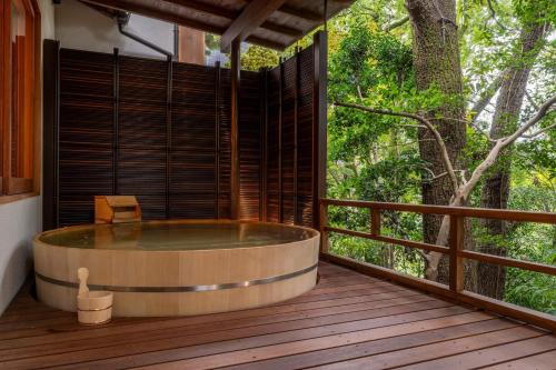 Hadano Hotel | Relax at Jinya Ryokan: 4-Star Retreat with Hot Tub & Dining
