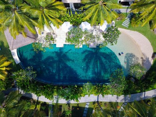 Kuta Resort | Relax at Jivana Resort: Oceanfront Bliss with Spa & Pool