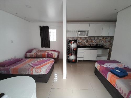 Simoes Lopes Apartment | Pet-Friendly JK Quitinete Executivo: Central Convenience Awaits