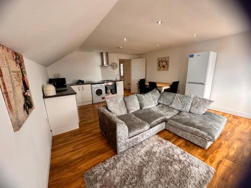Withernsea Apartment | Discover Comfort at Joe Kelly Buildings C - Family Friendly Stay