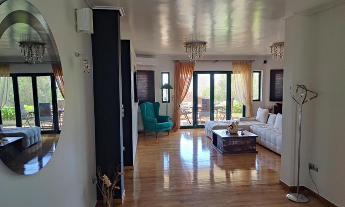 Spata-Artemida Apartment | Experience John's Modern Apartments with Oceanfront Views