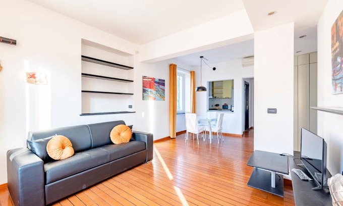 Sturla Apartment | JOIVY Modern Flat: Family-Friendly & Steps from the Sea