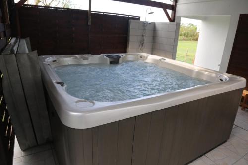 Les Mangles House | Inviting Bungalow with Hot Tub and Ocean Views at Roberto