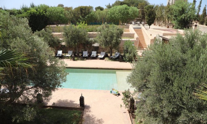 Ounagha Bed & Breakfast | Elegant Guest Rooms at Riad Dharma with Ocean Views
