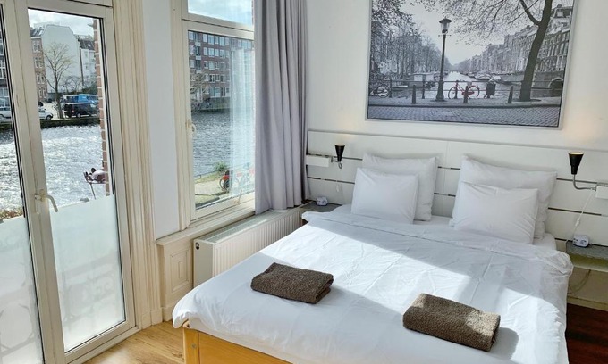 Staatsliedenbuurt House | Discover Jordaan View: Family-Friendly Stay with High Ratings