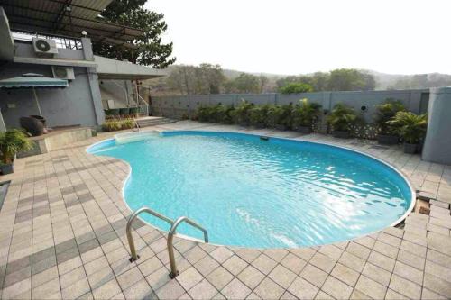 Ambernath Villa | Inviting Jumbo Pool Villa in Ambernath for Family Fun