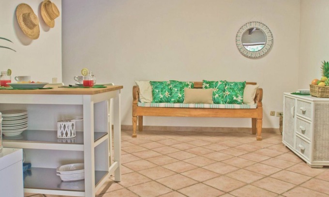 Santa Margherita di Pula Cottage | Jungle House Tucan: Oceanfront Retreat with Breakfast