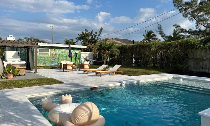Lake Worth House | Experience Jungle Cottage: Pool, Hot Tub & Ocean Views