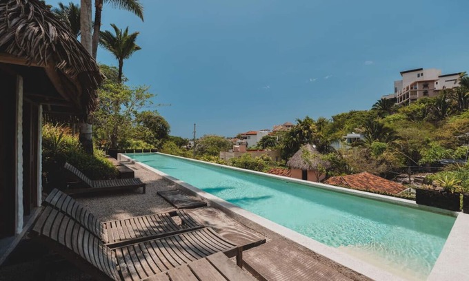 North End Apartment | Jungle luxe retreat with pool